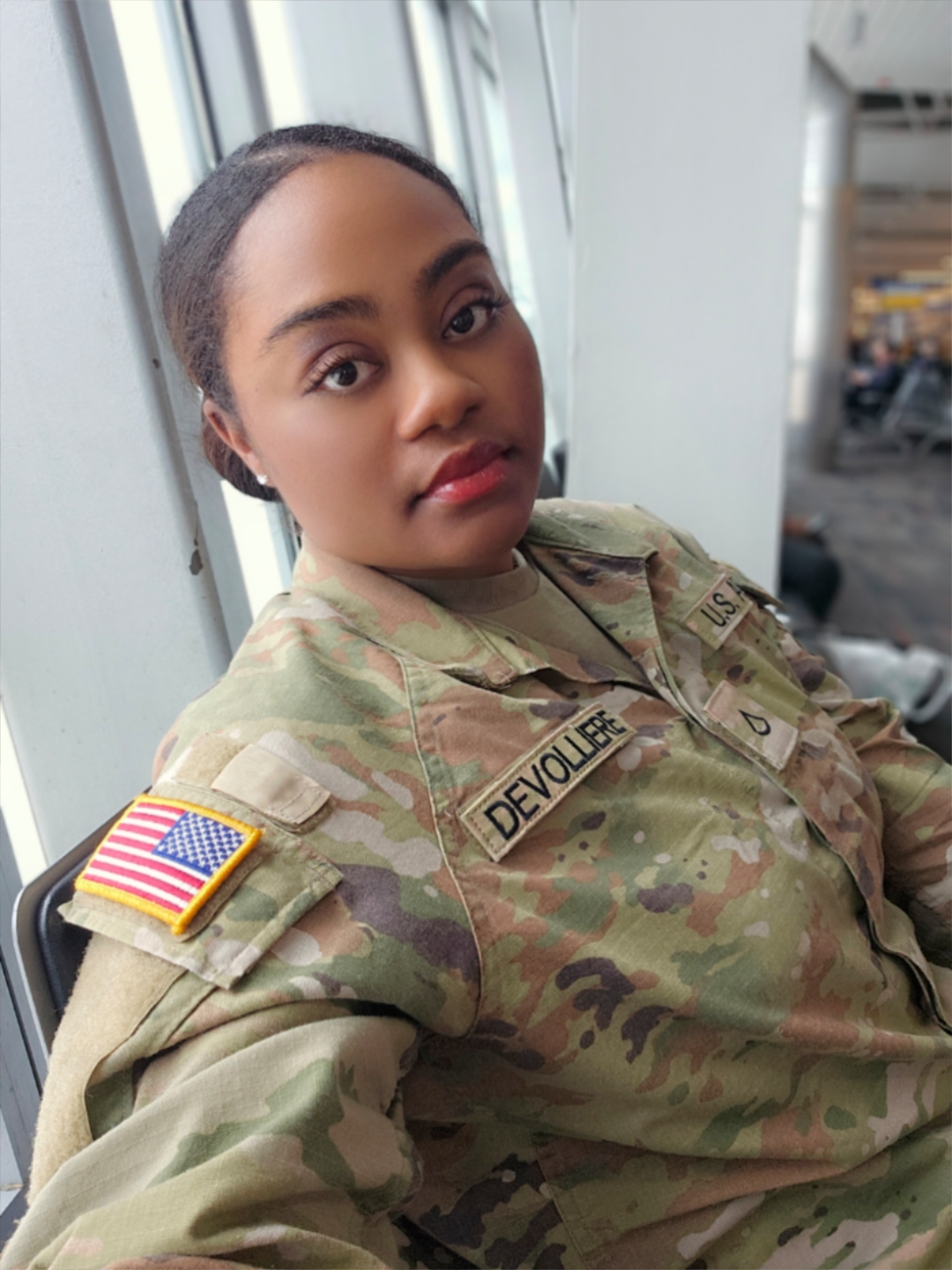 Gloria in U.S. Army uniform, name tape Devolliere